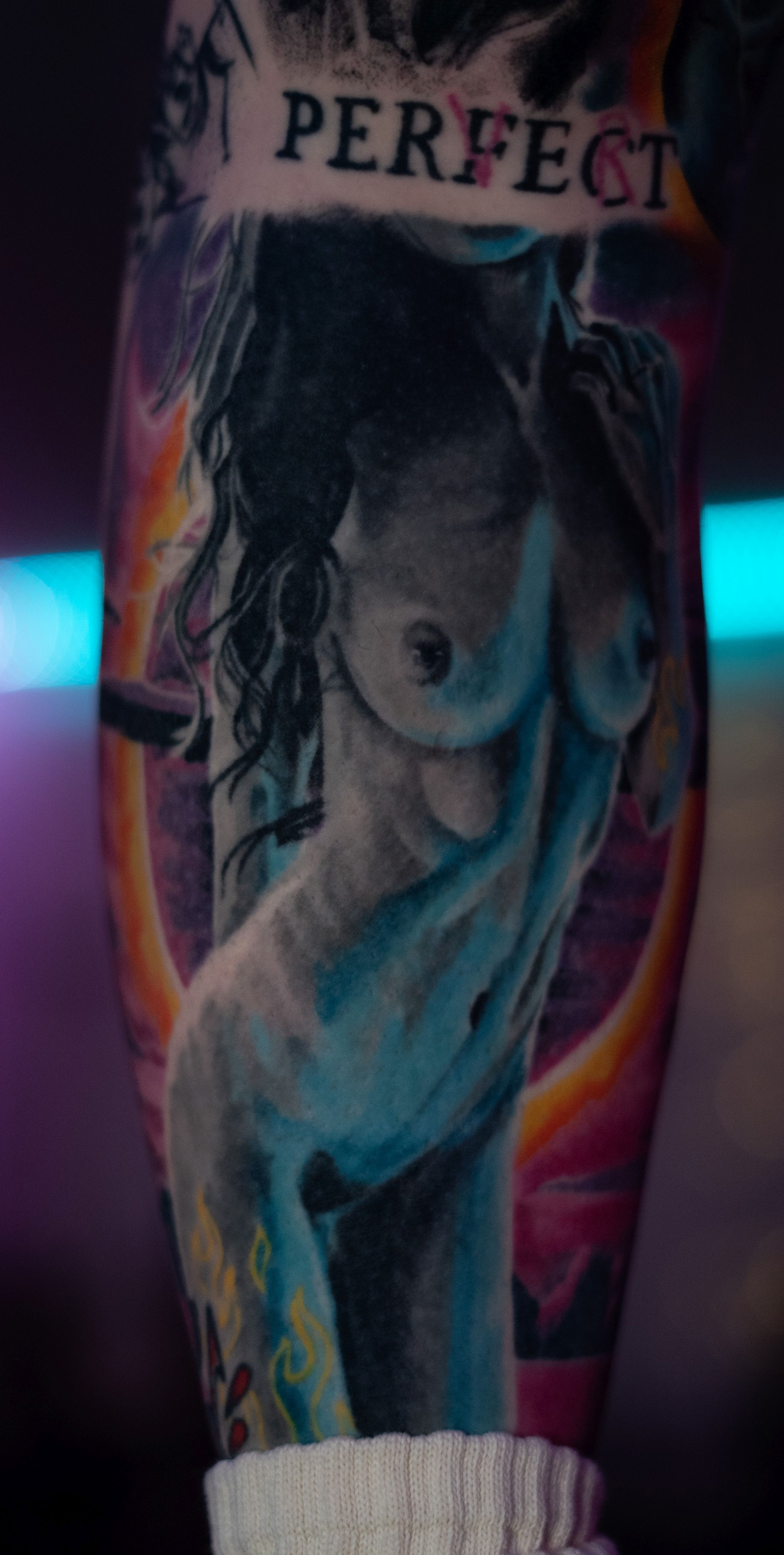 Surrealist figurative tattoo